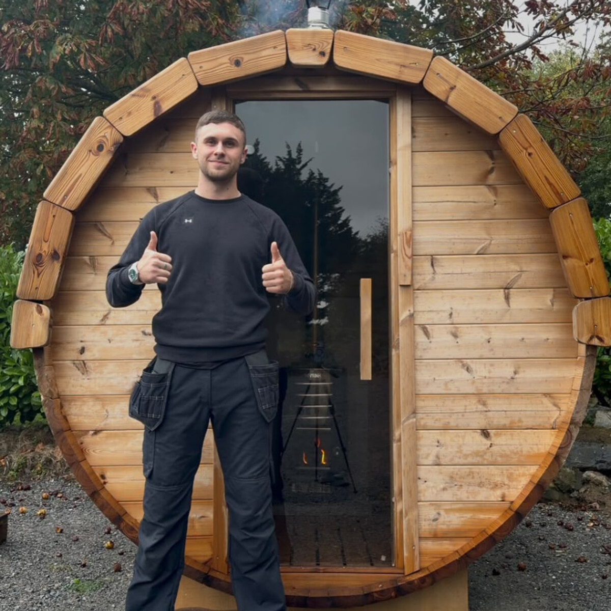 Dan Fortune, founder of Revival Health Labs, outside one of our barrel saunas